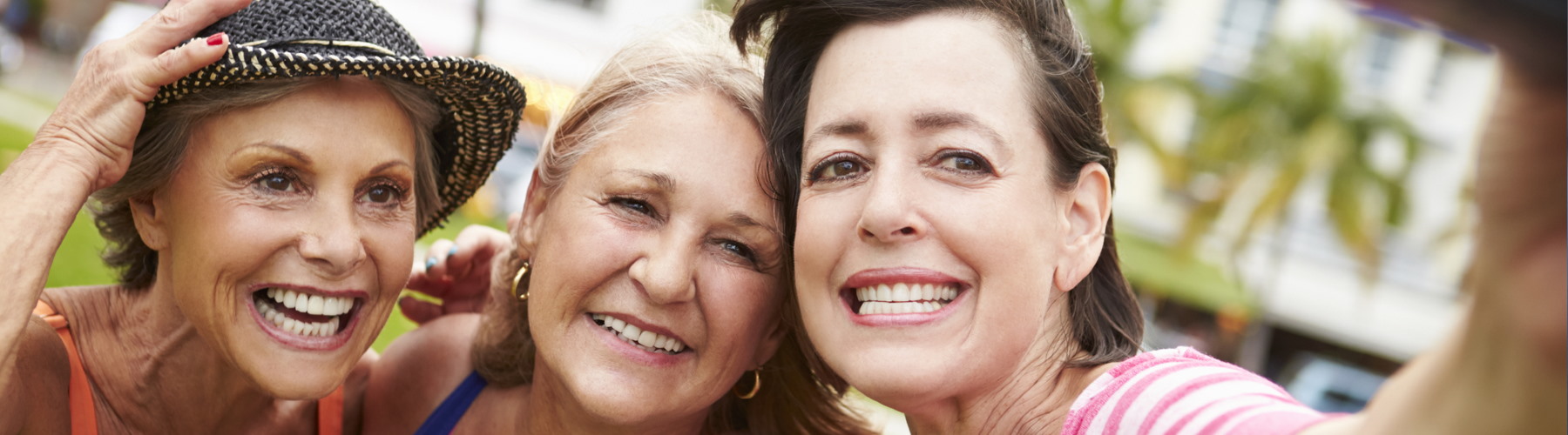Life insurance represented three women taking a selfie